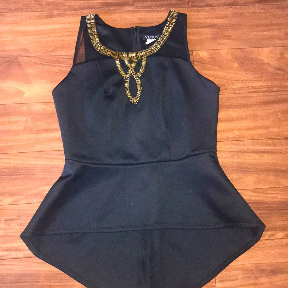 Black embellished with gold trim top